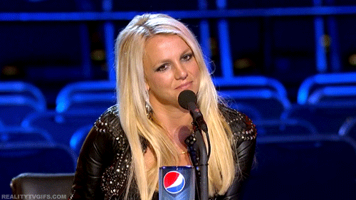 A gif of Britney Spears reacting with shock, of the negative kind